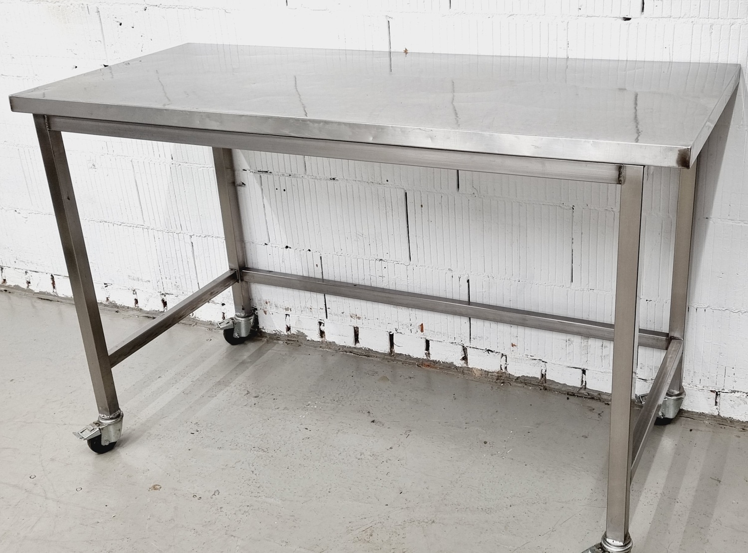 Arbeitstisch AT 1600 mit Edelstahlplatte fahrbar