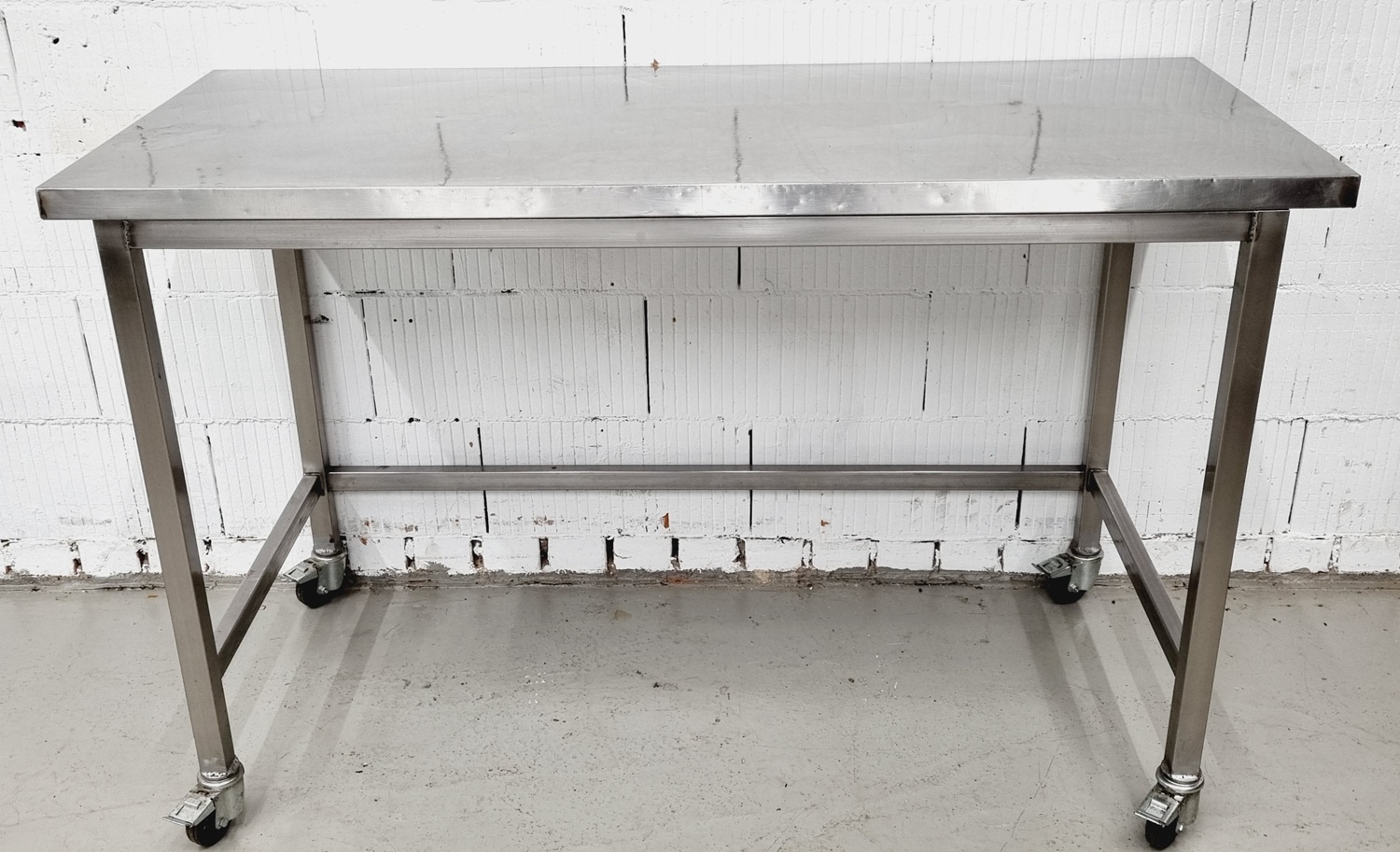 Arbeitstisch AT 1600 mit Edelstahlplatte fahrbar